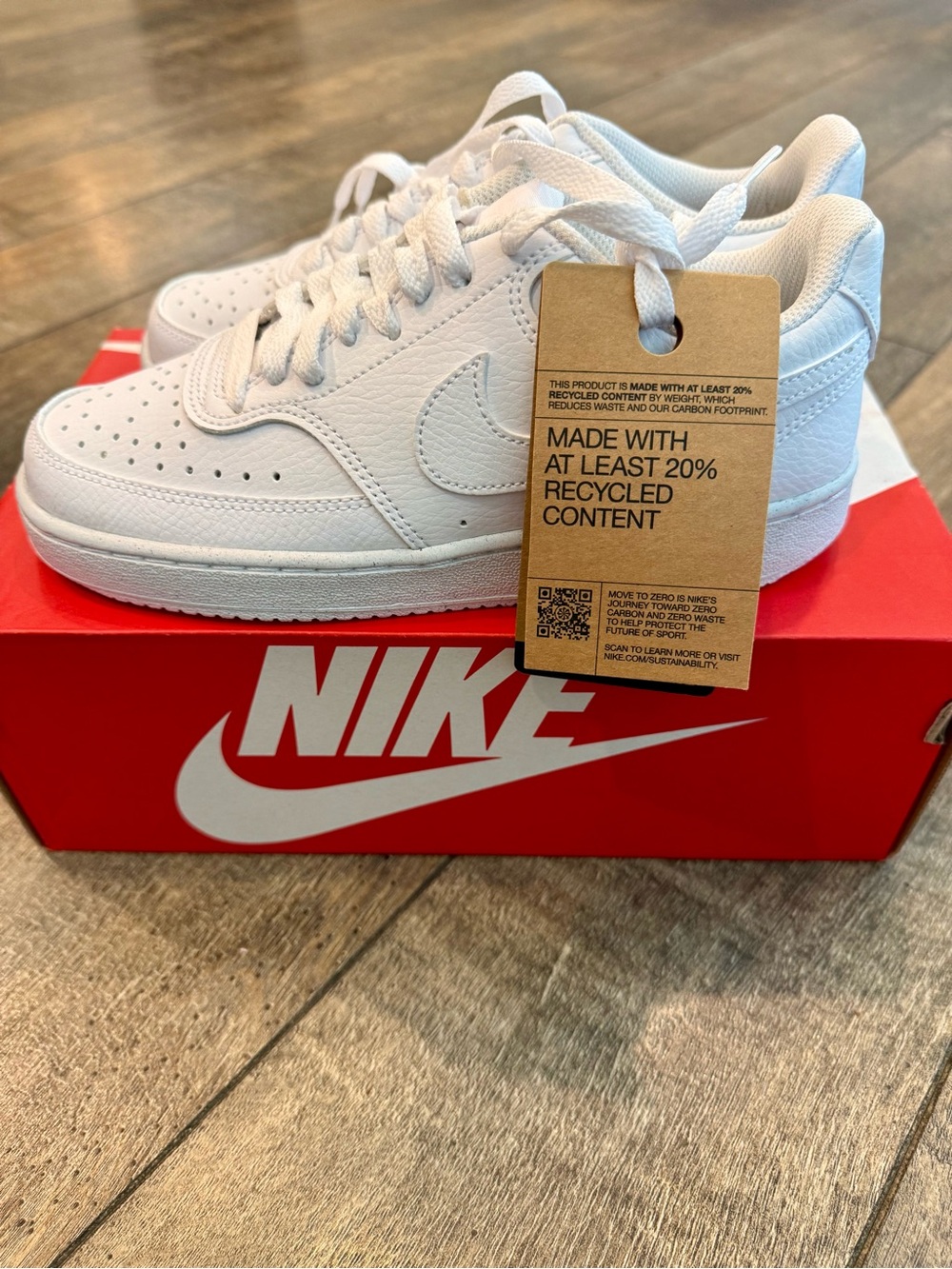 Nike White Low-Top Leather Sneakers with Recycled Content Tag